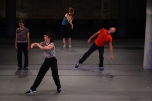 Yvonne Rainer, Trio A Pressured (In the Midnight Hour), 1999— 2011. Performance at Dia:Beacon, Riggio Galleries, Beacon, New York. Saturday, October 22, 2011. Performers: Pat Catterson, Emmanuele Phuon, Emily Coates, and Keith Sabado. Photo: © Paula Court. Courtesy Dia Art Foundation, New York.