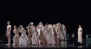Stéphane Buillion (left), Maria Riccarda Wesseling (mezzo-soprano, seated in black), and Marie-Agnès  Gillot (standing, far right) with members of Paris Opera Ballet in the company's production of "Orpheus and Eurydice" at Lincoln Center Festival, July 20, 8 pm, David H. Koch Theater.